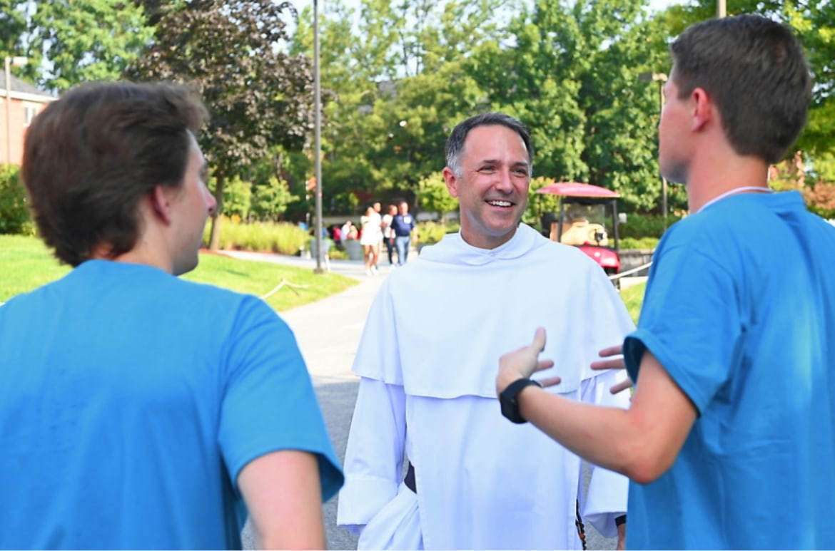 Three men in discussion