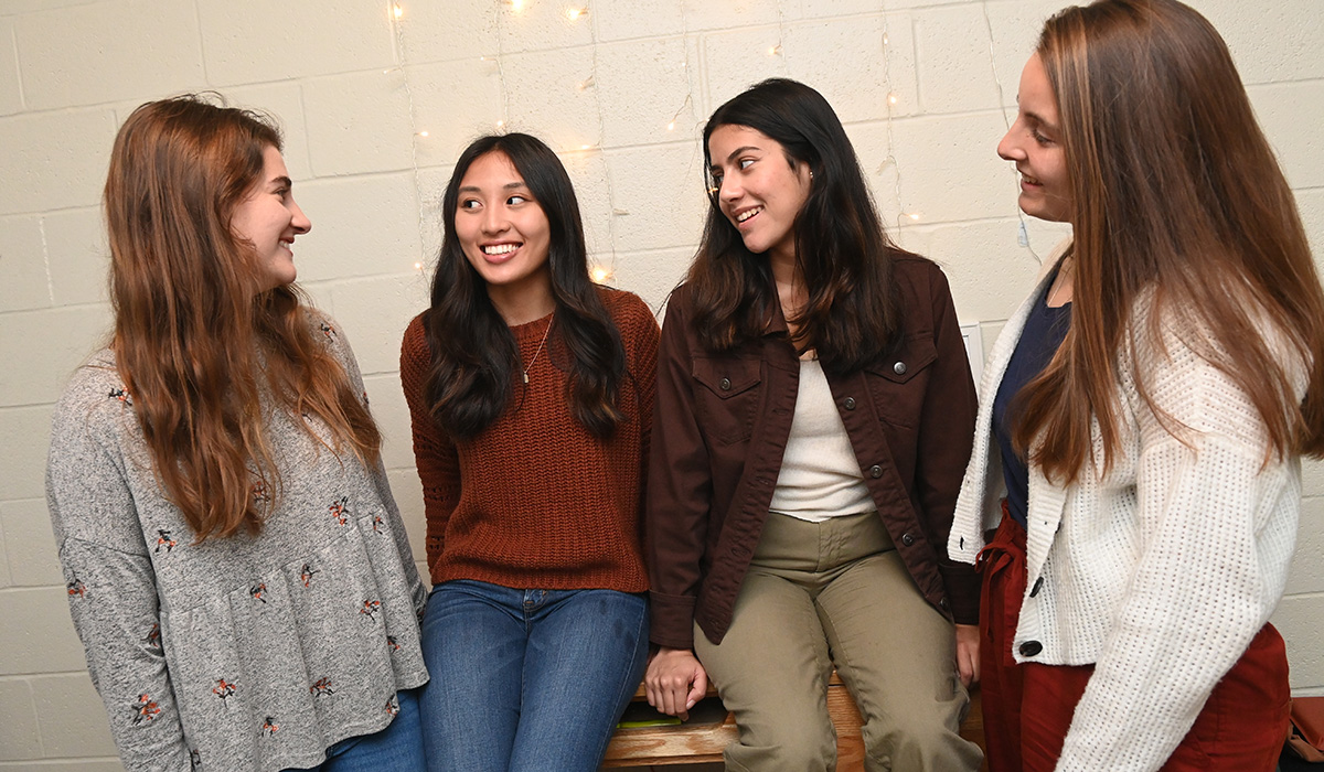 female students smiling and laughing