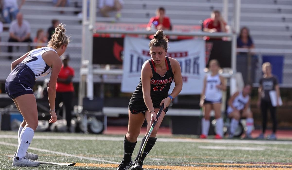 Niki Micciche on the field hockey field playing