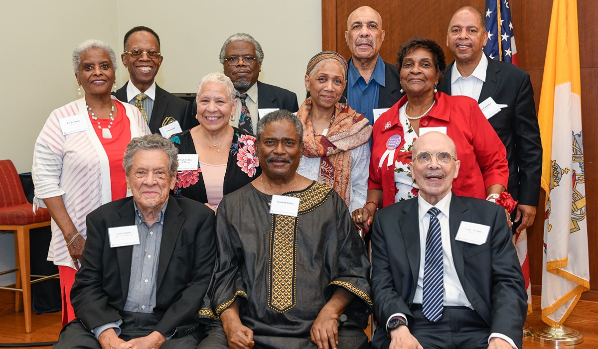 A group of people smiling at the camera