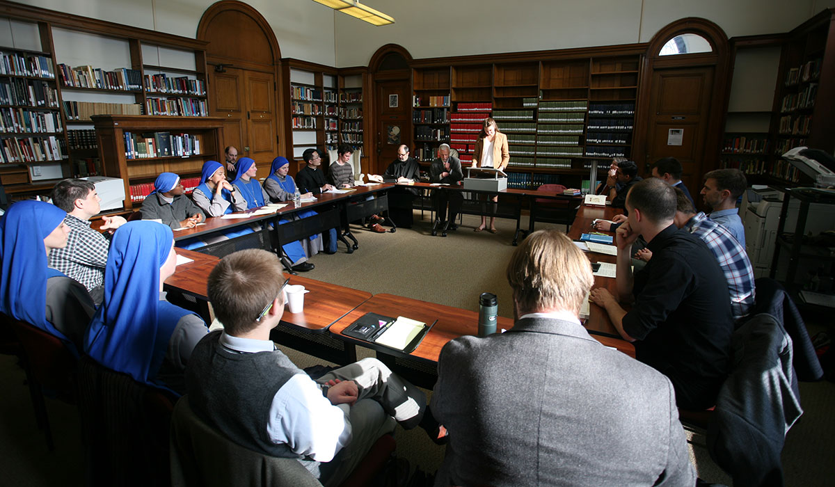 People at table in room