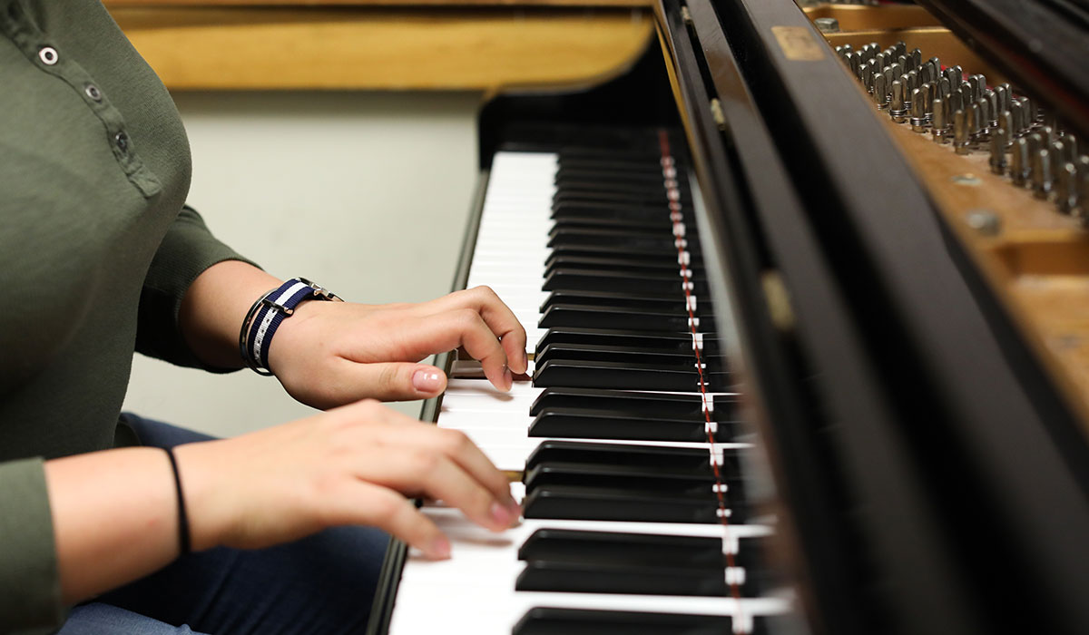 Person playing piano