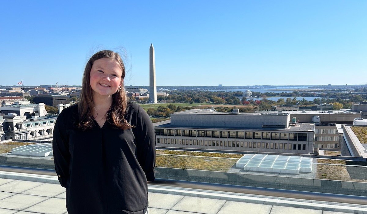 Erin Huber with the Washington Monument in the background