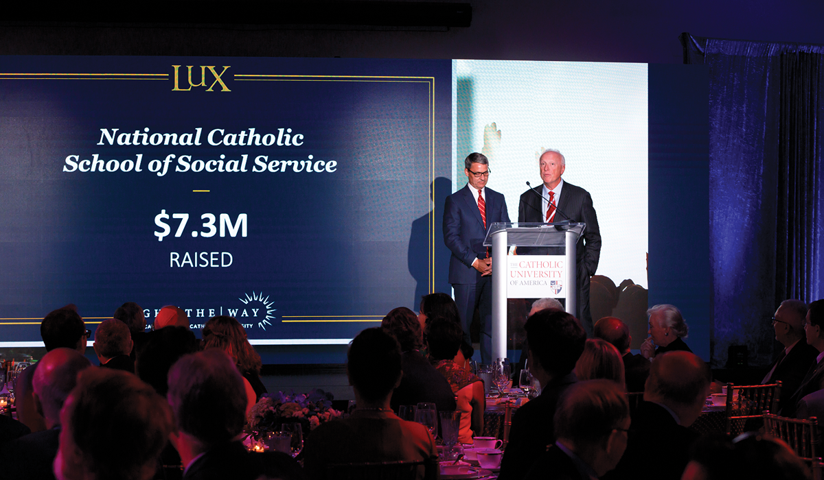 University Board of Trustees Chair Victor Smith, J.D. 1996, left, and Campaign Co-chair Joe Carlini, B.M.E. 1984, helped announce the total amounts raised for the University's schools and athletics department.