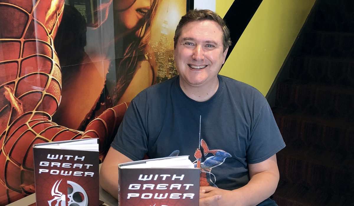 Sean O'Connell with his book titled With Great Power