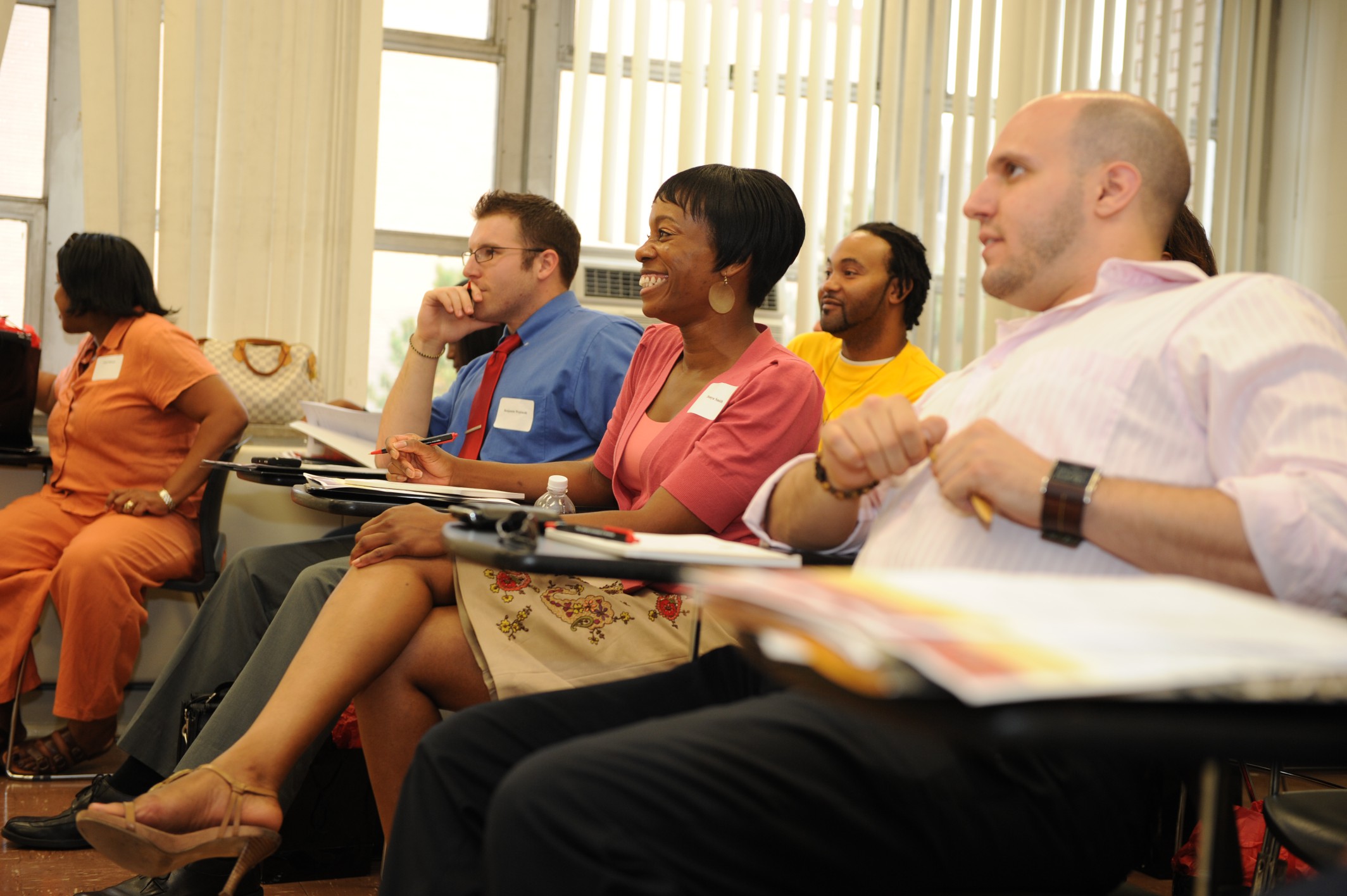 Adult students participating in a lecture