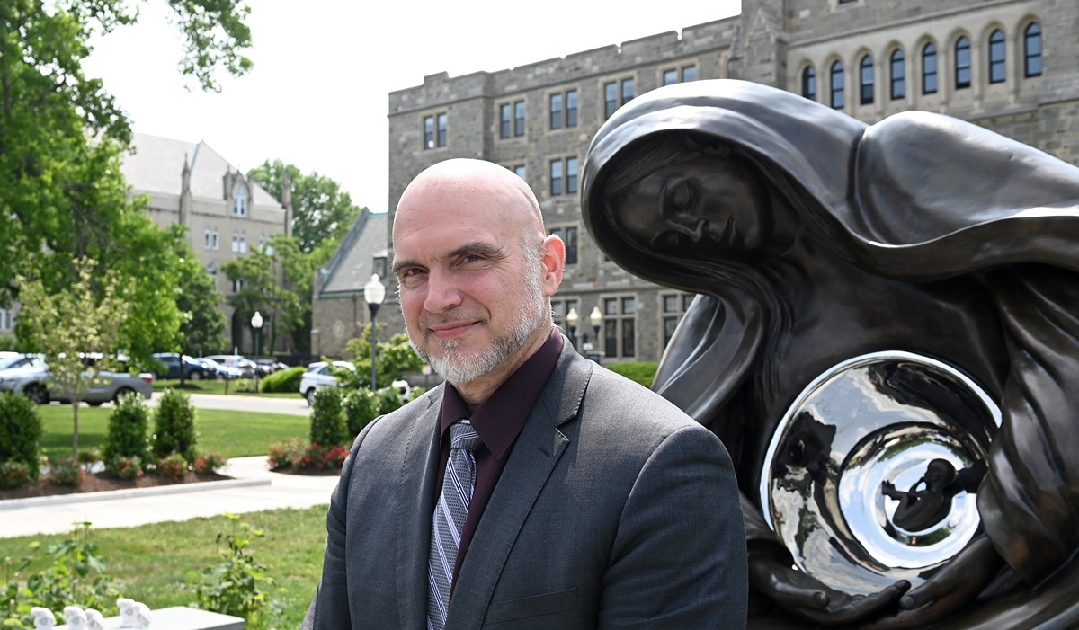 A new sculpture of a pregnant Blessed Virgin Mary was unveiled and blessed by Washington Cardinal Wilton Gregory in front of Theological College, the national seminary of The Catholic University of America, May 17.