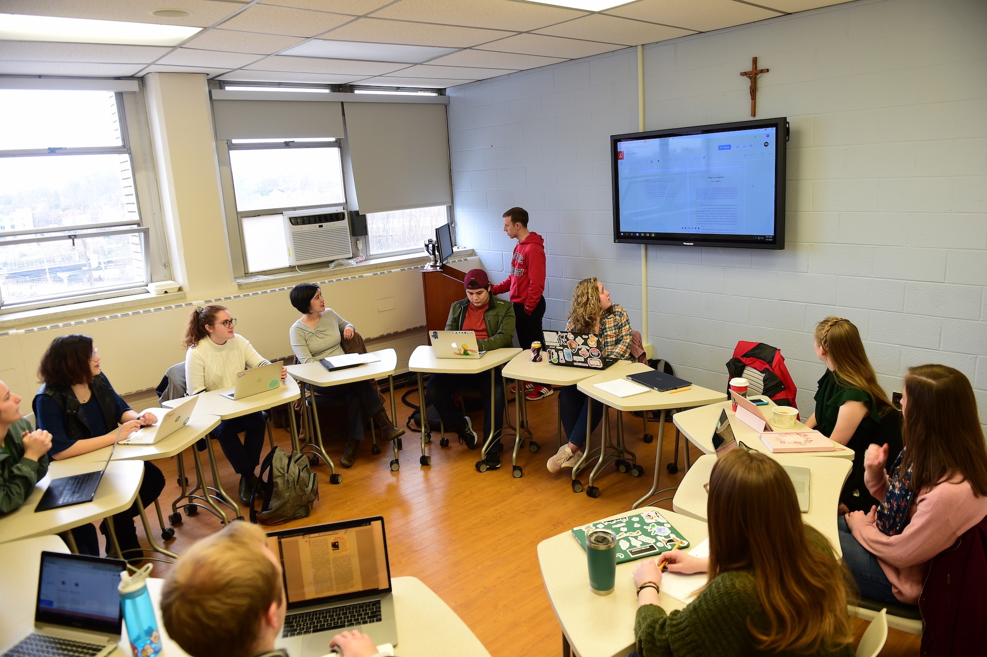 inventio staff gathered in a circle discussing the next issue