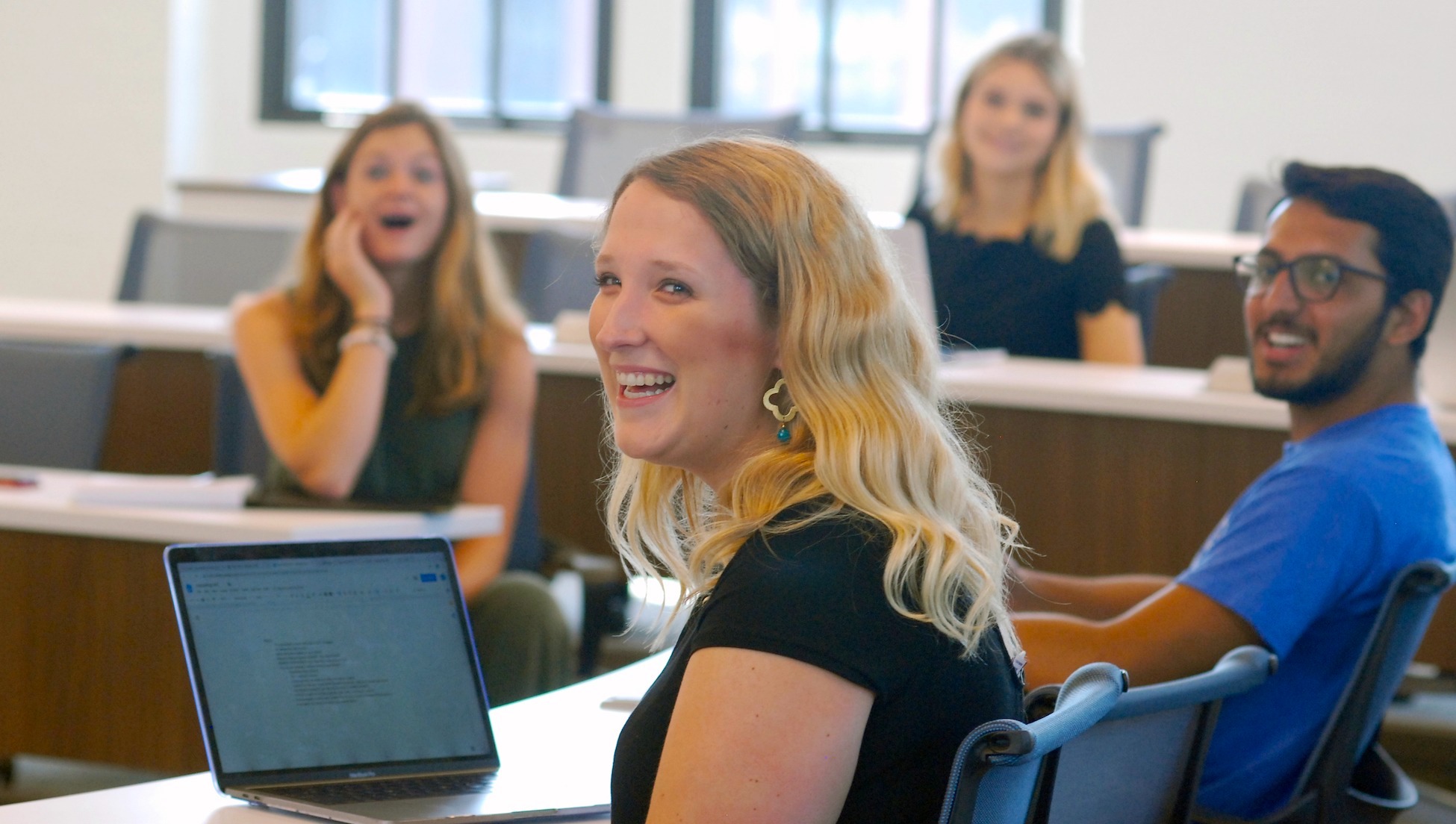 students laughing together during class