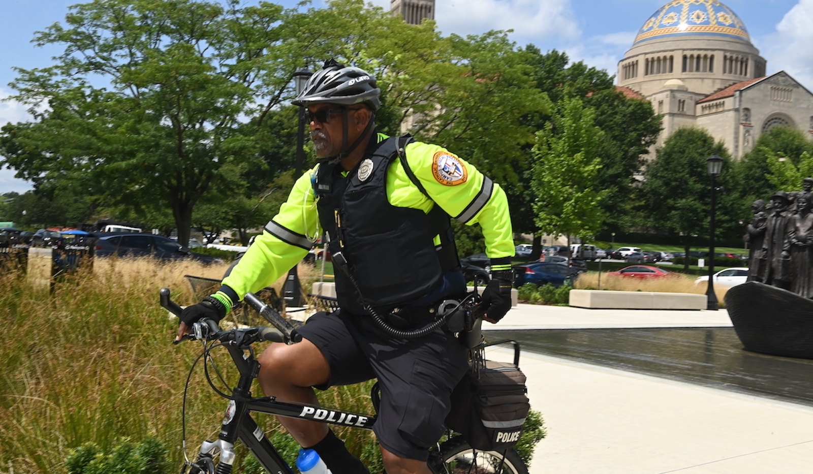 department of public safety officer on a bike on campus