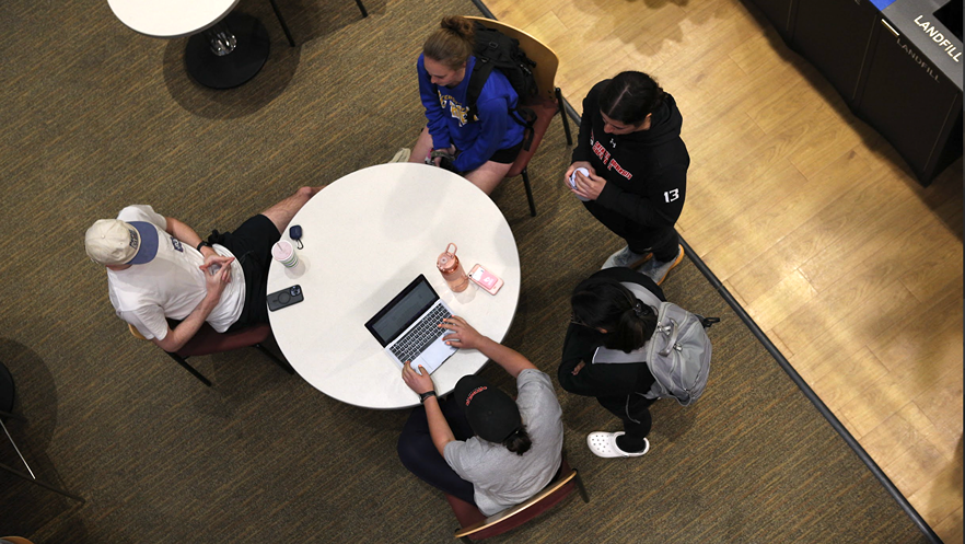 students studying together at a round table