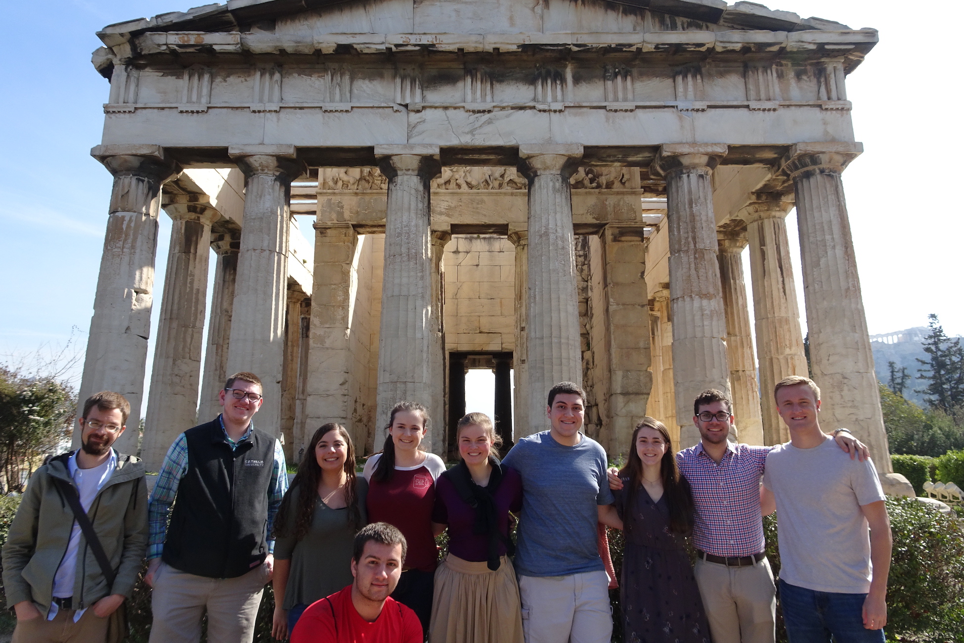 students in front of ancient greek ruins in Greece