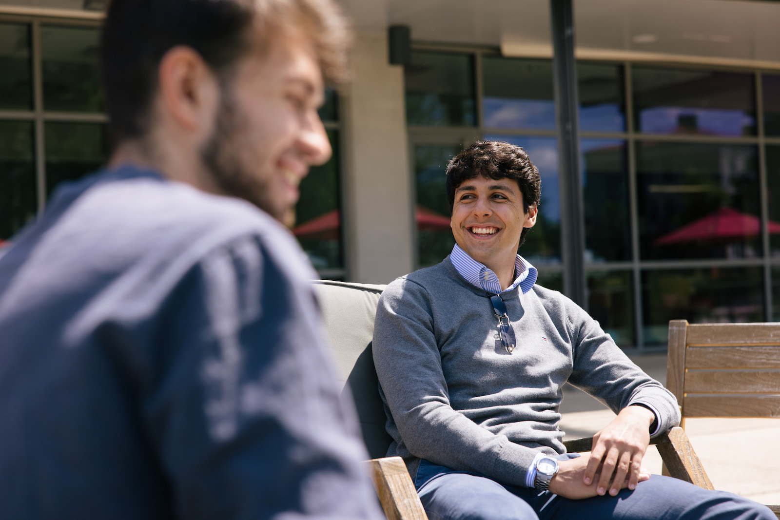 boys smiling and chatting outside