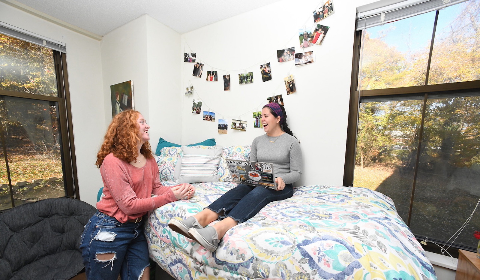 girls chatting in a dorm room