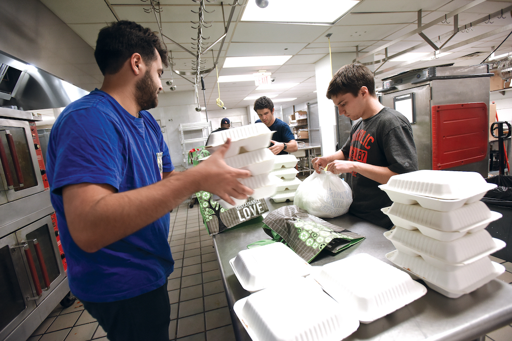 campus ministry preparing meals in a kitchen