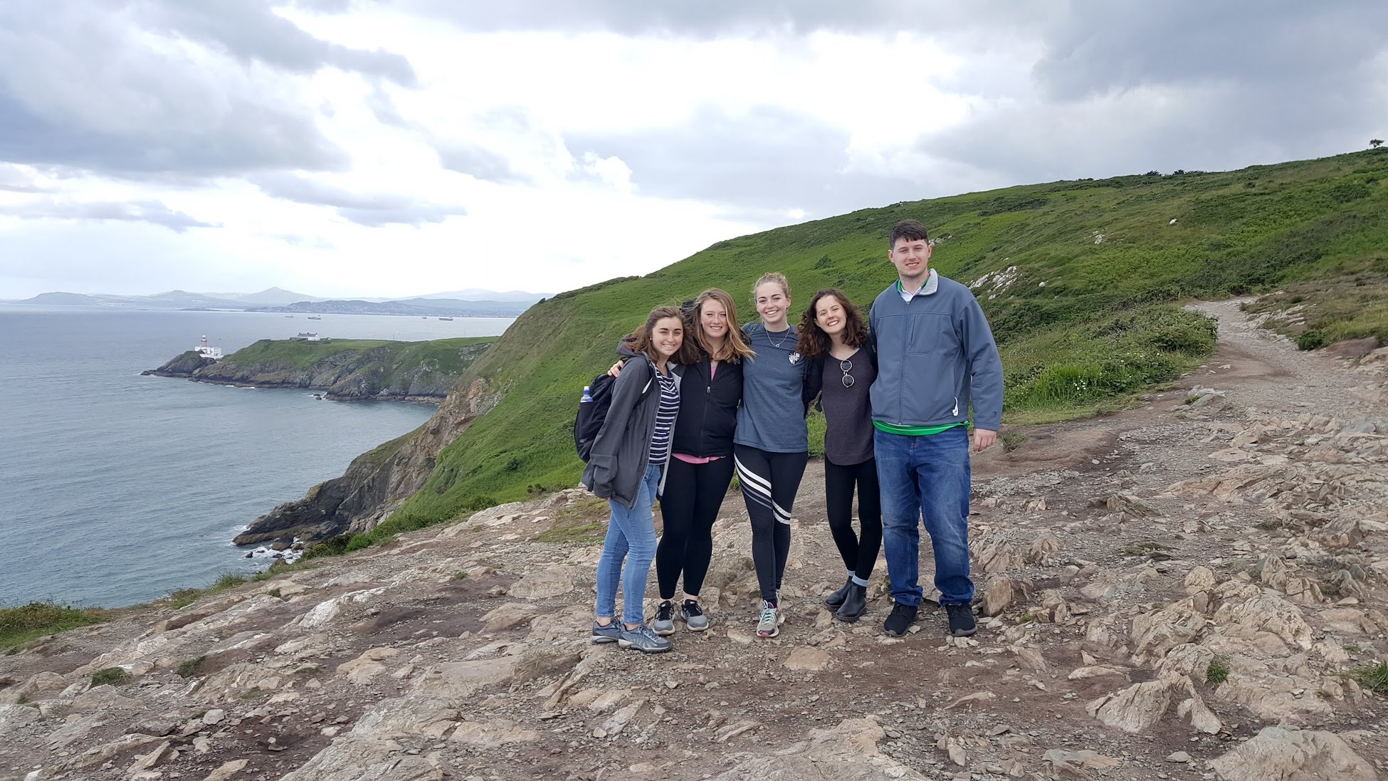 students exploring the seaside cliffs of Ireland