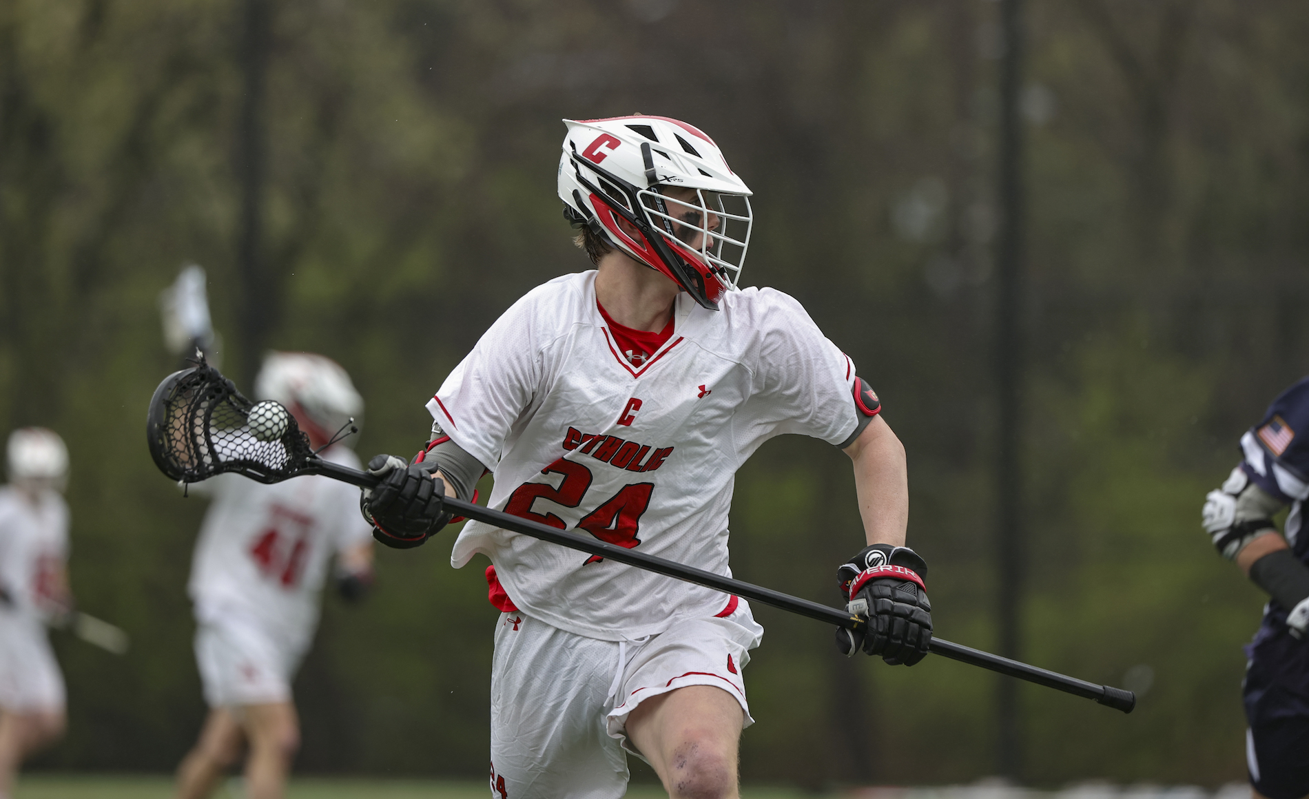 student playing for the CUA men's lacrosse team