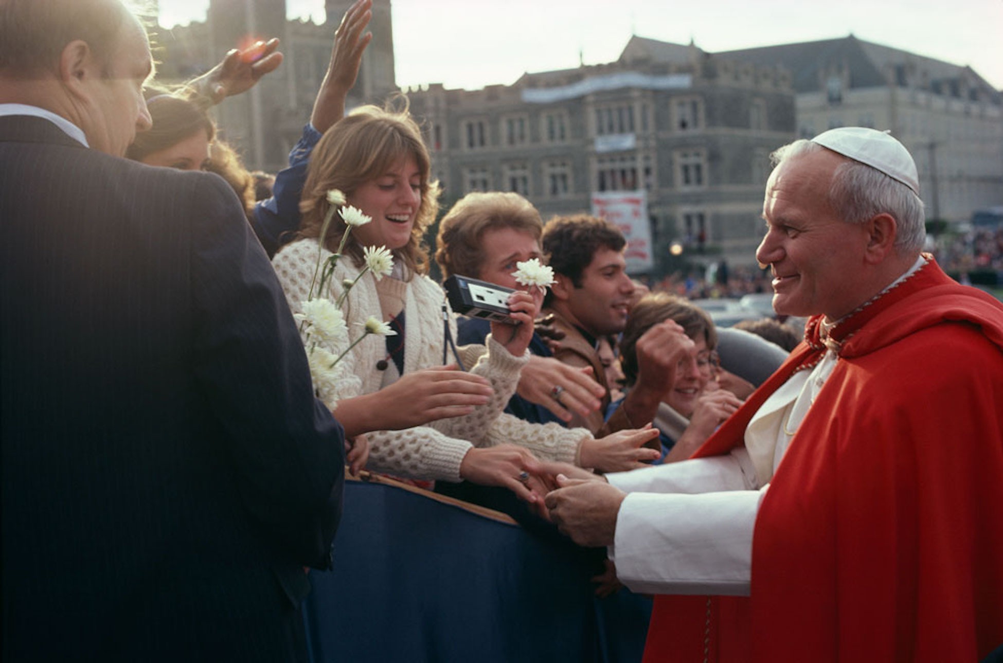 Pope John Paul II greets people on Catholic University's campus