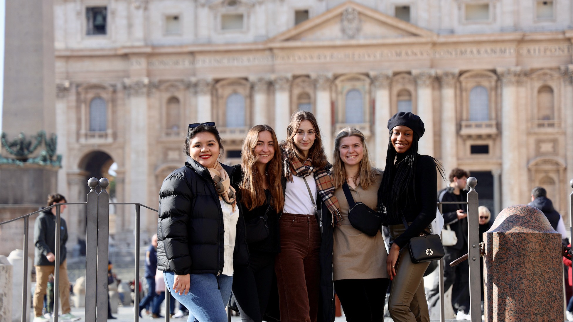 students in front of St. Peter's basilica in Rome