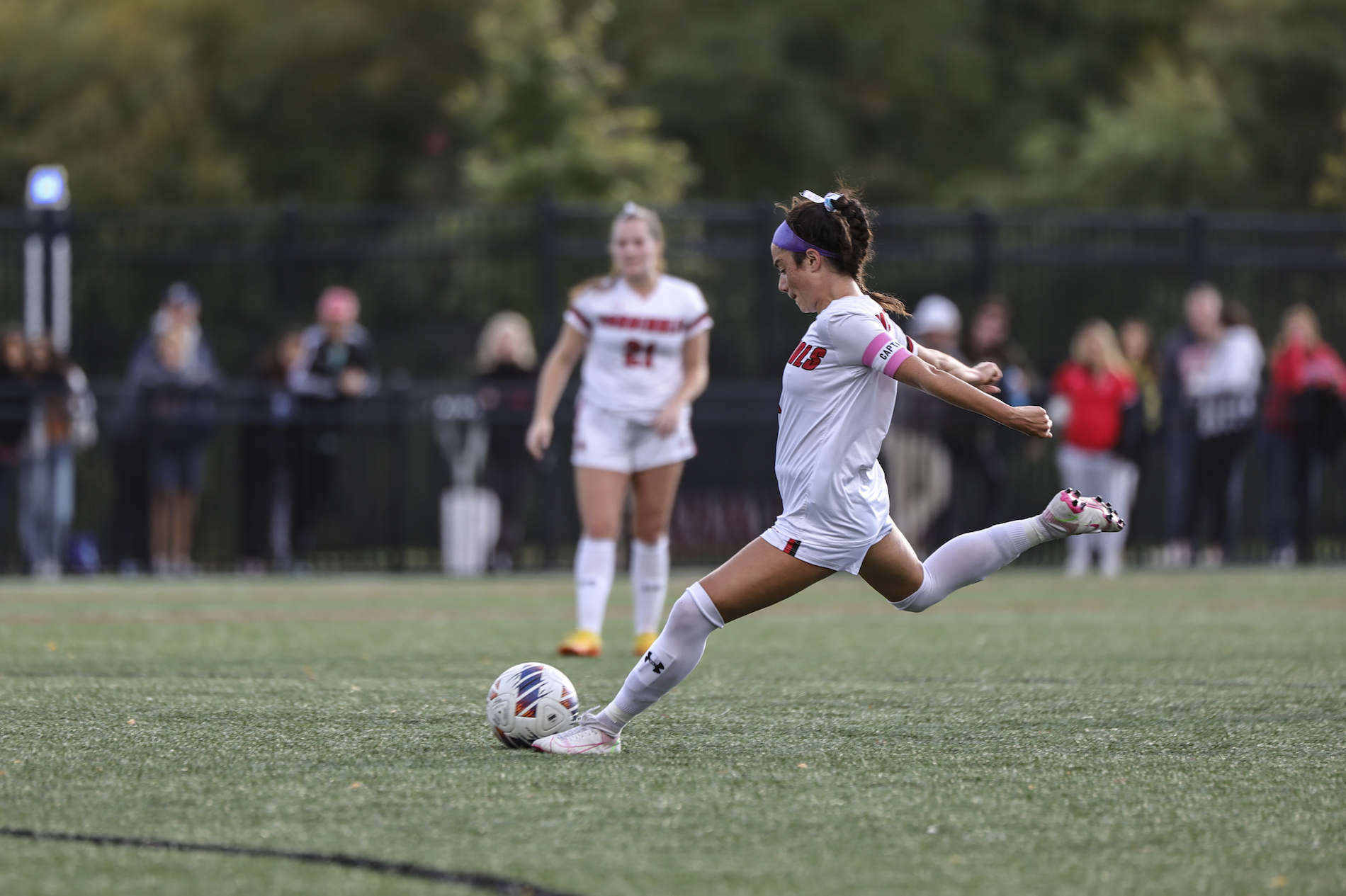 student playing for the women's soccer team