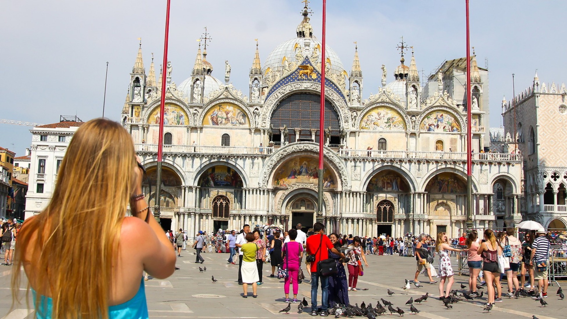 student taking a picture of St. Mark's Basilica in Venice