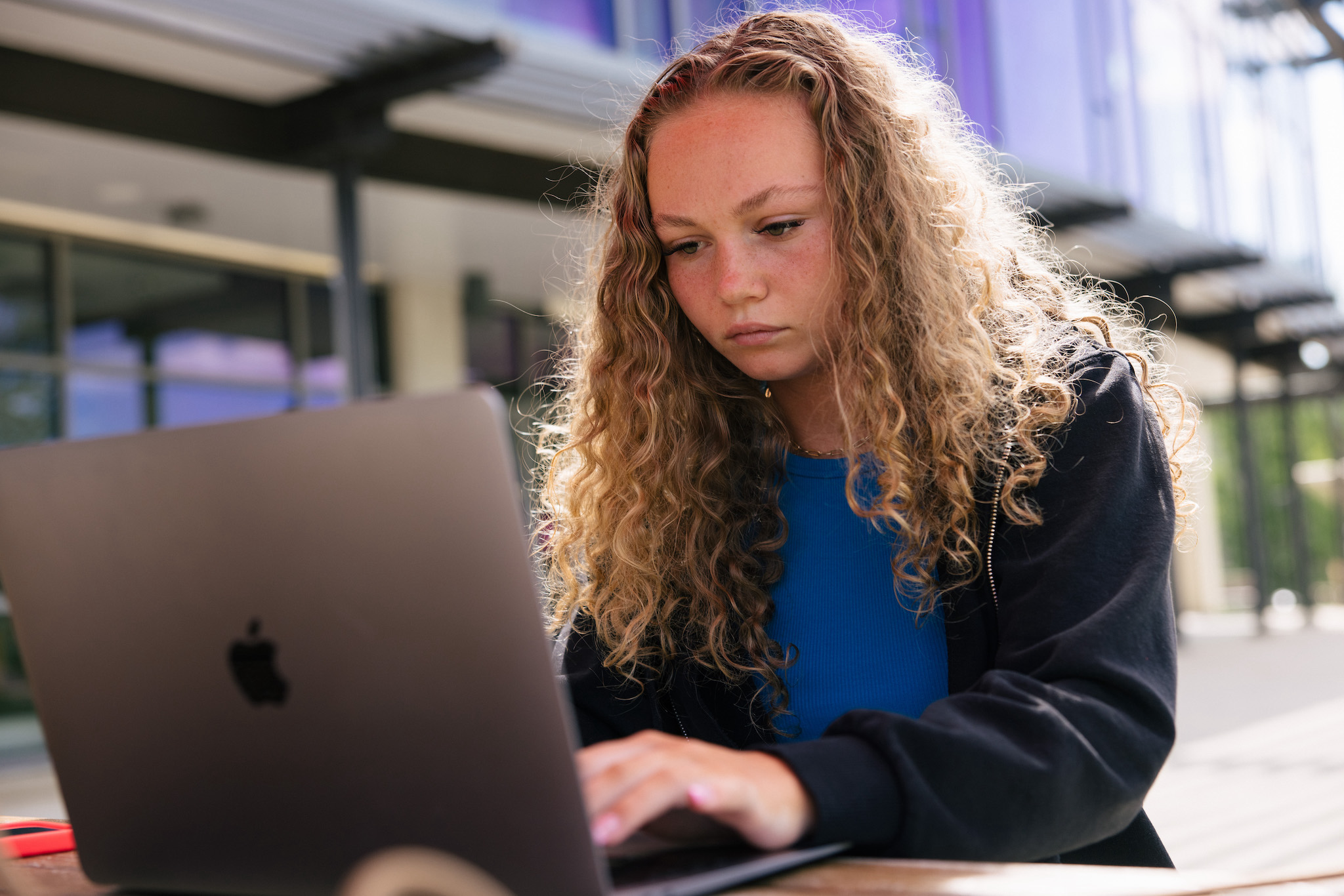 female student on laptop