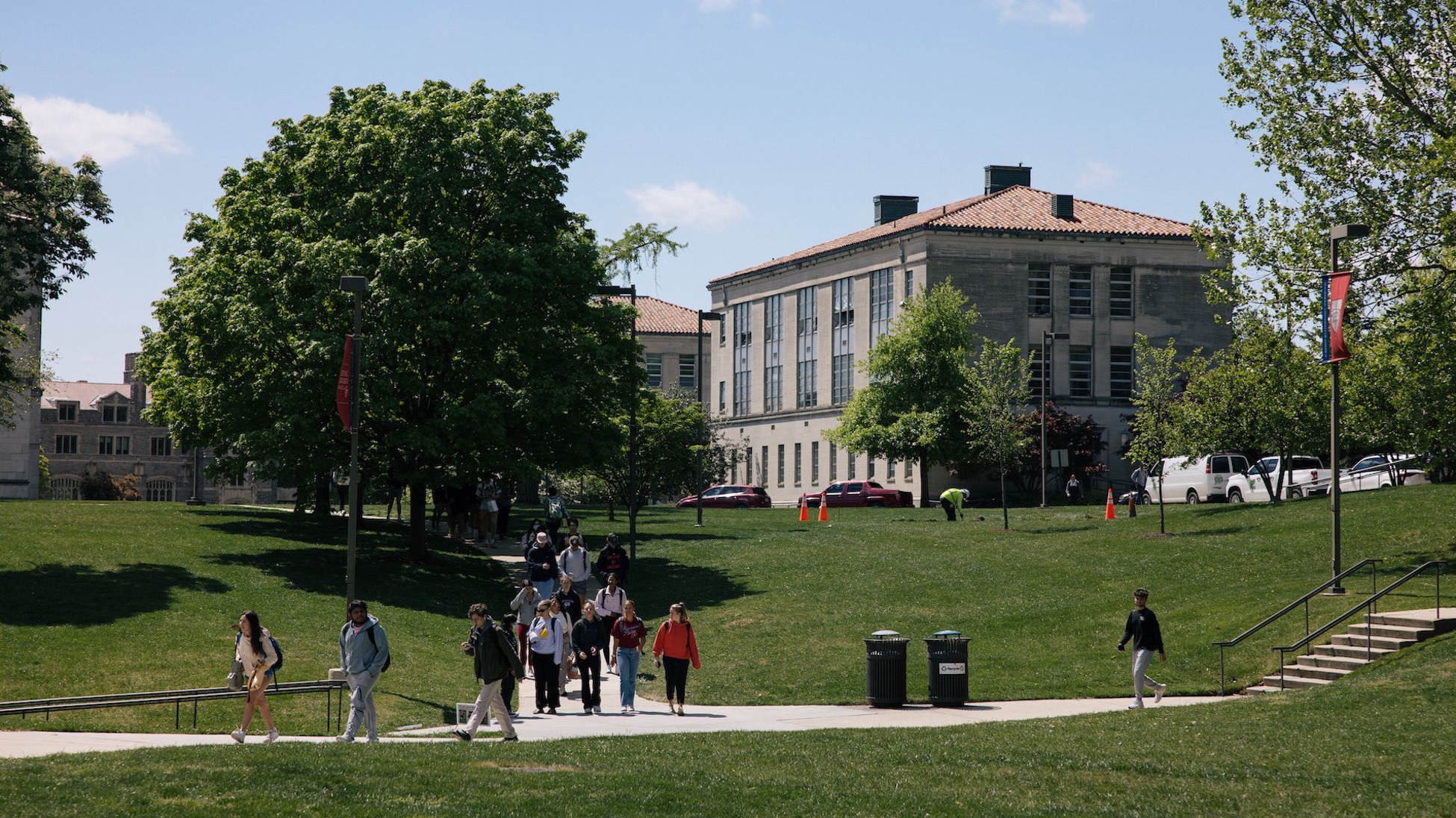 students walking across our beautiful, green campus