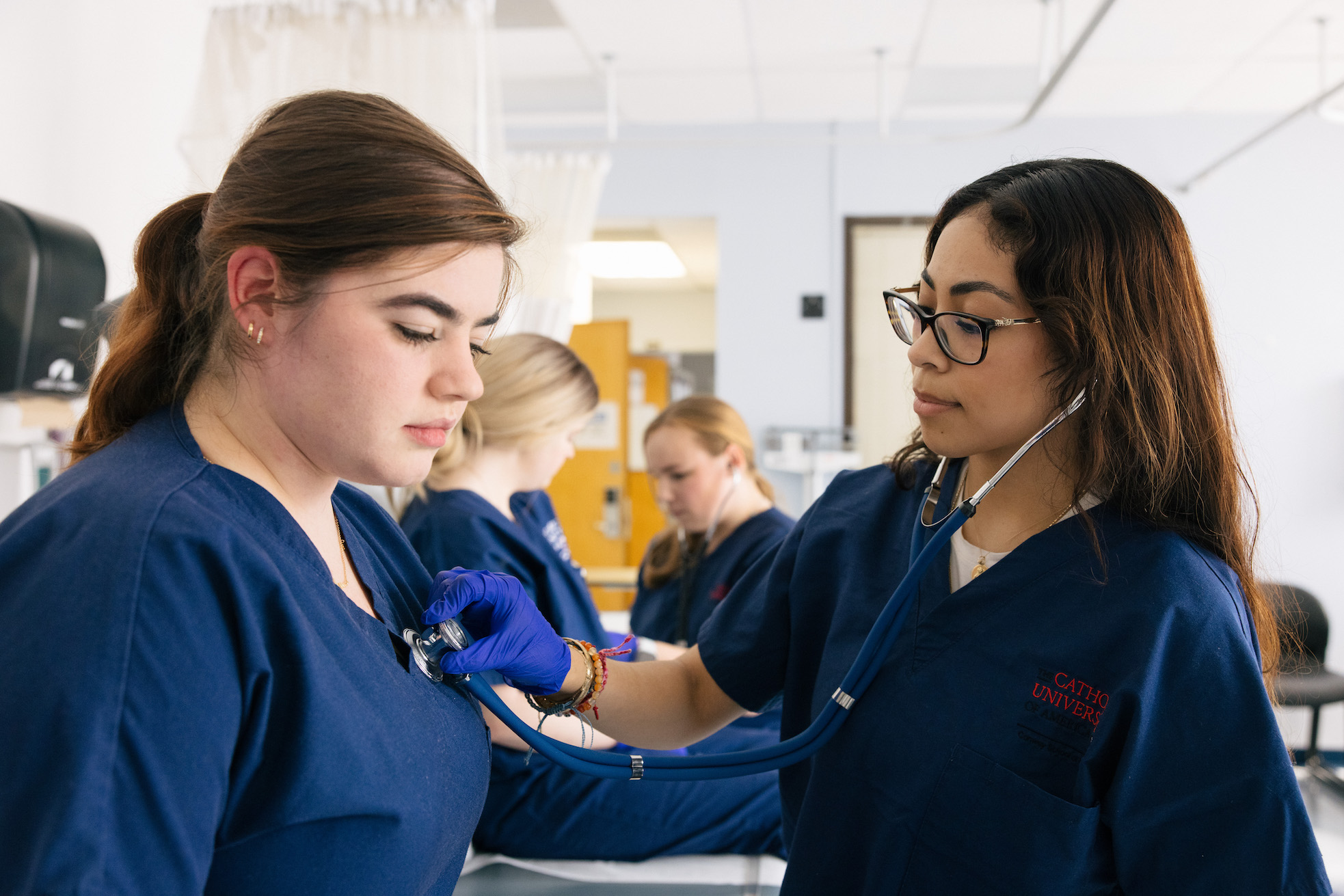 nursing students listening to heartbeats