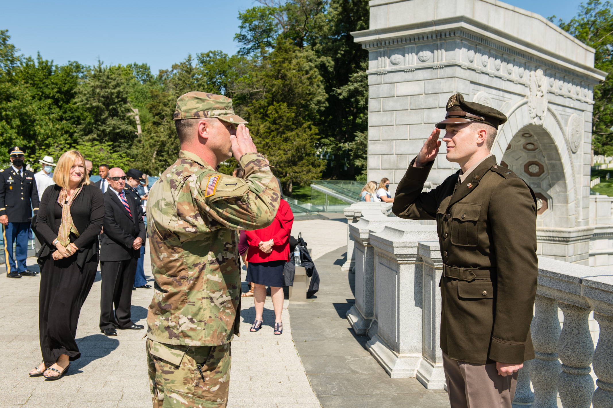 military men saluting one another