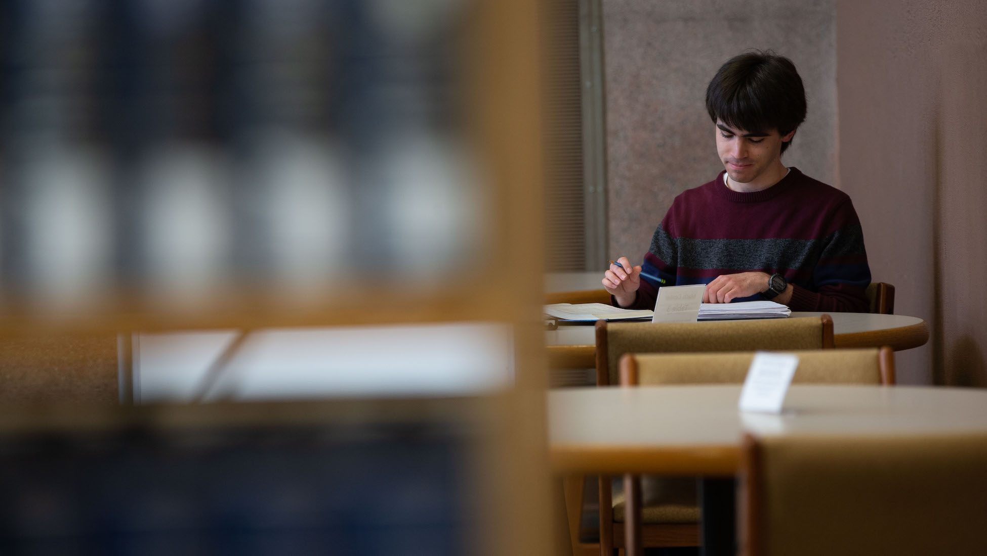 student studying in the library 