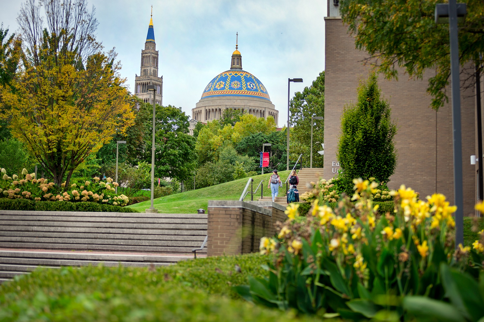 campus green space with the basilica dome in the background