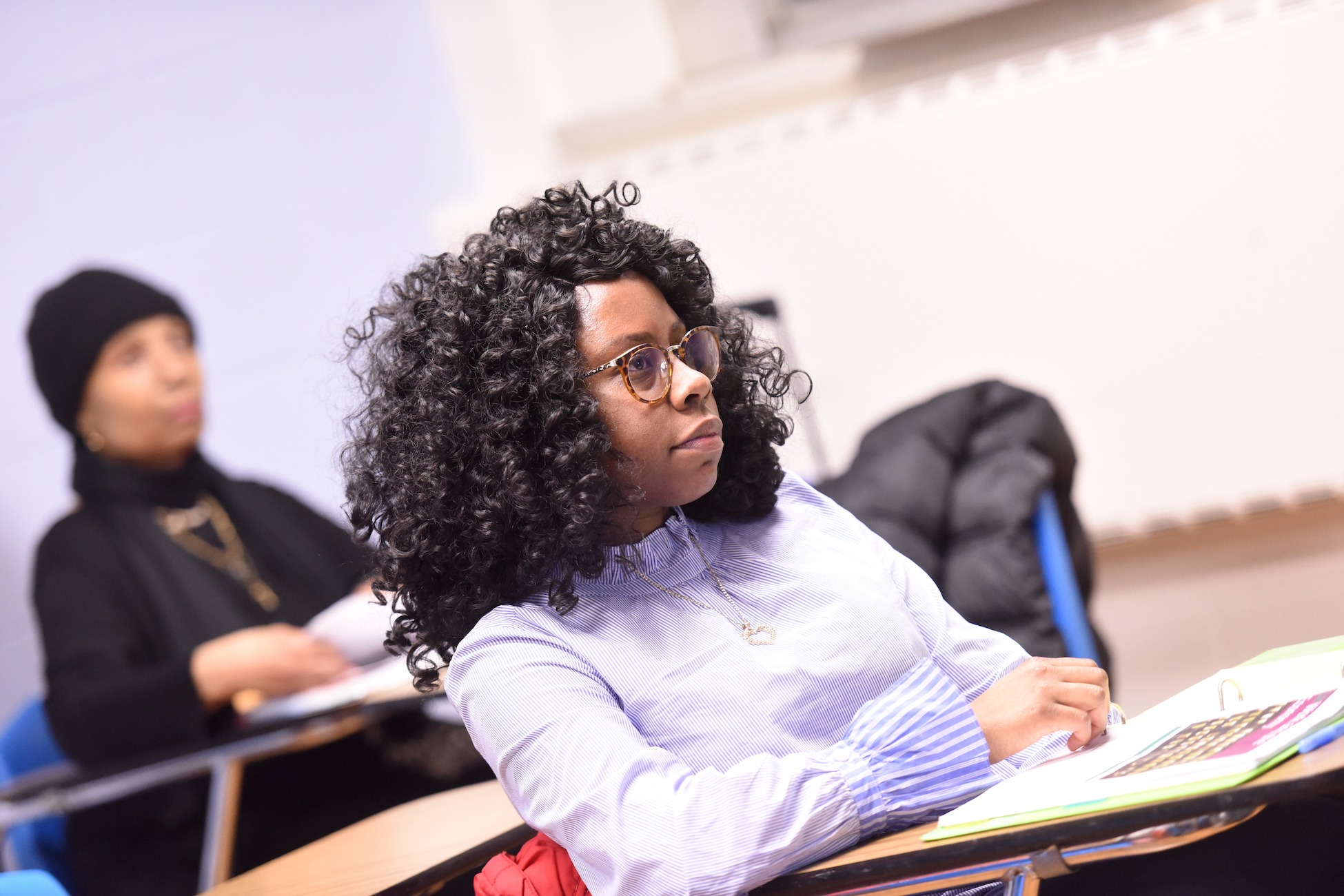 adult student paying attention in class