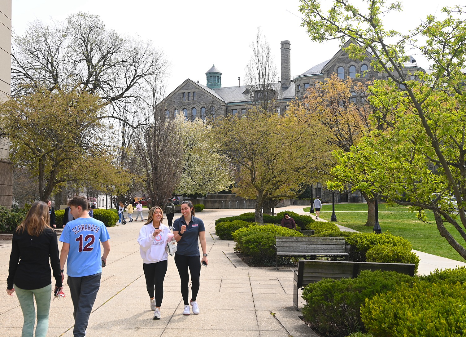 students walking across campus