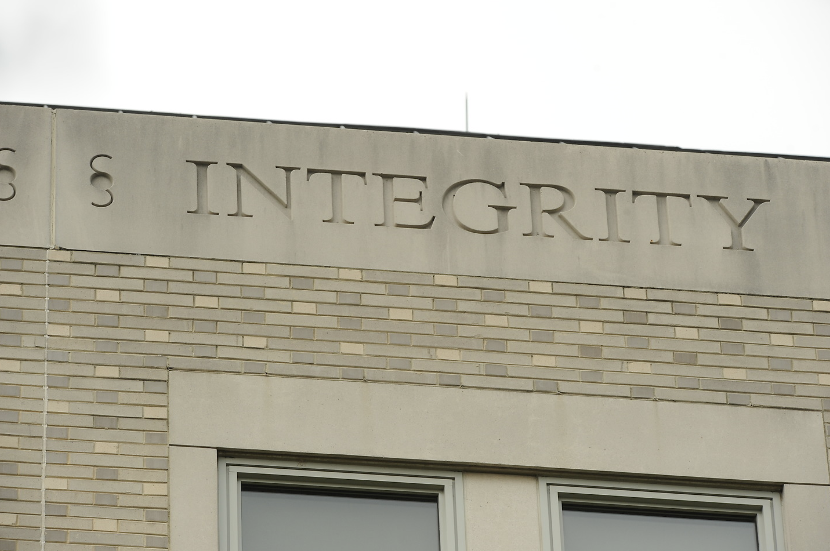 the words integrity engraved on a building