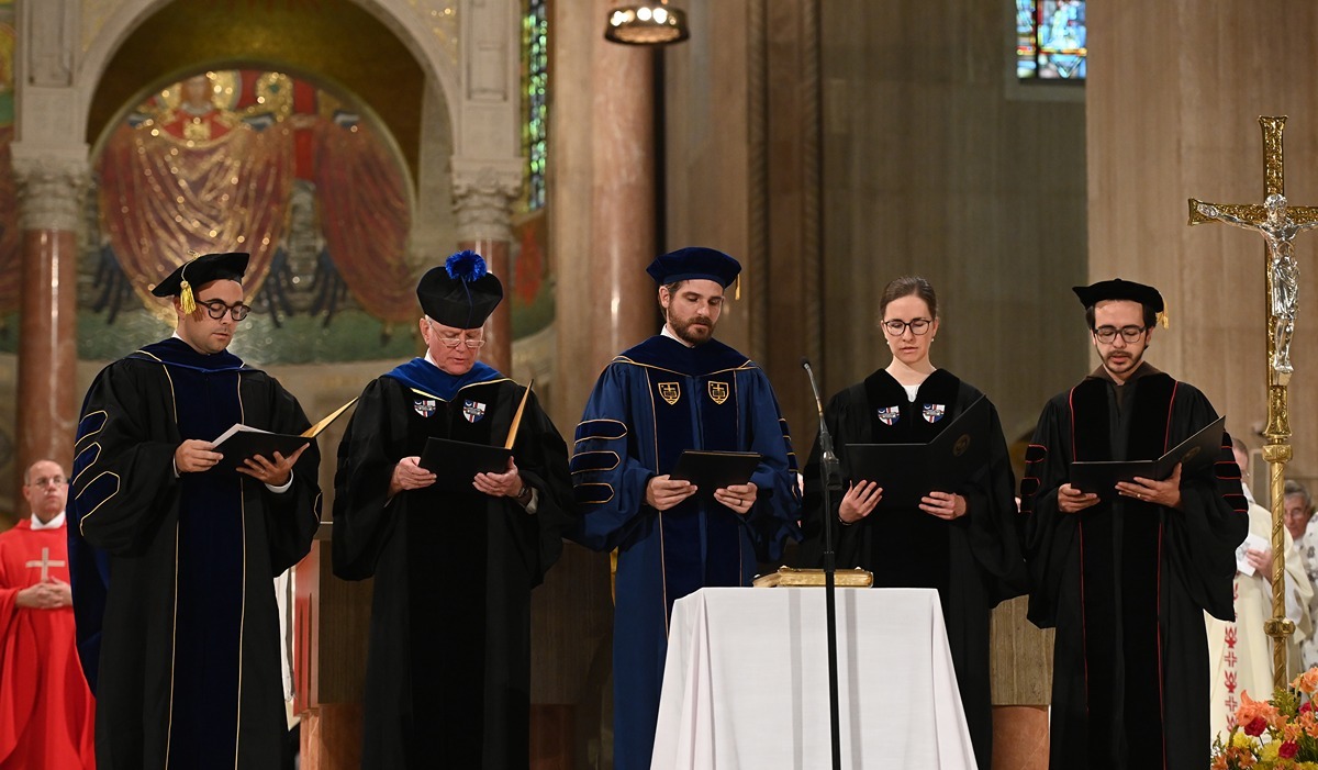 Faculty at the Mass of the Holy Spirit.