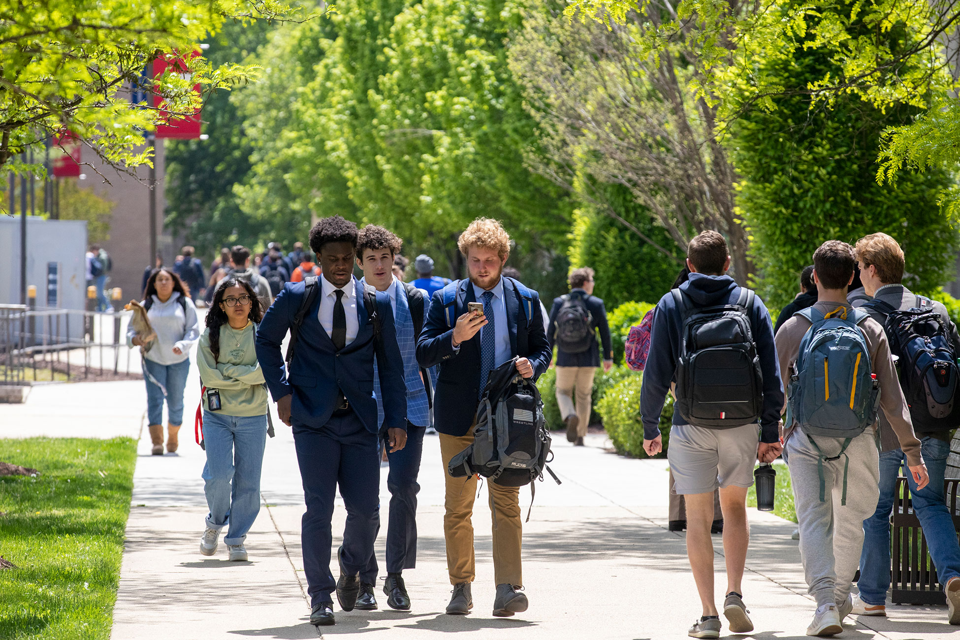 Students walking to class on campus.