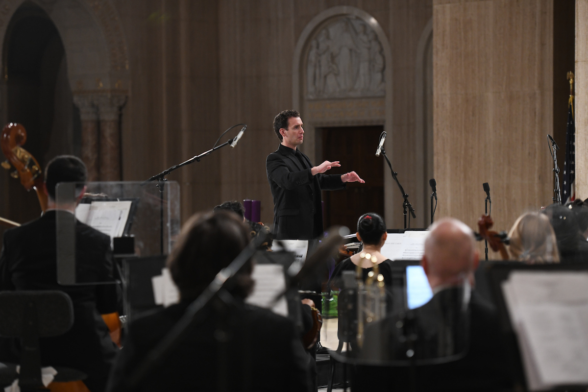  Head of Sacred Music and Director of Choral Activities Peter Kadeli conducts the performers at the 35th Annual Christmas Concert for Charity.