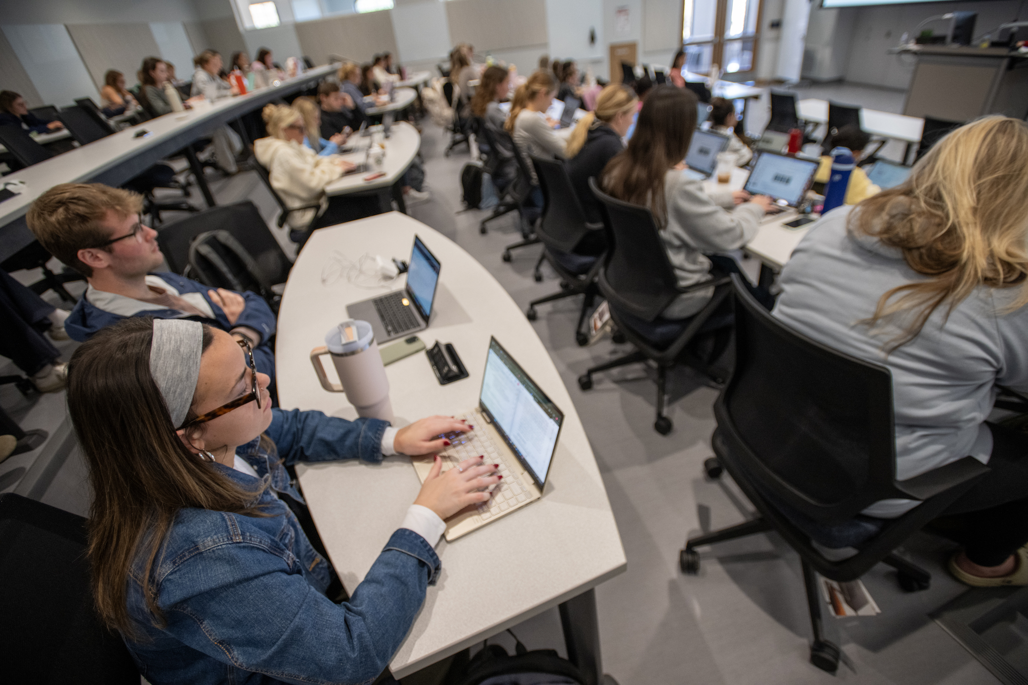 Full classroom with students on their laptops