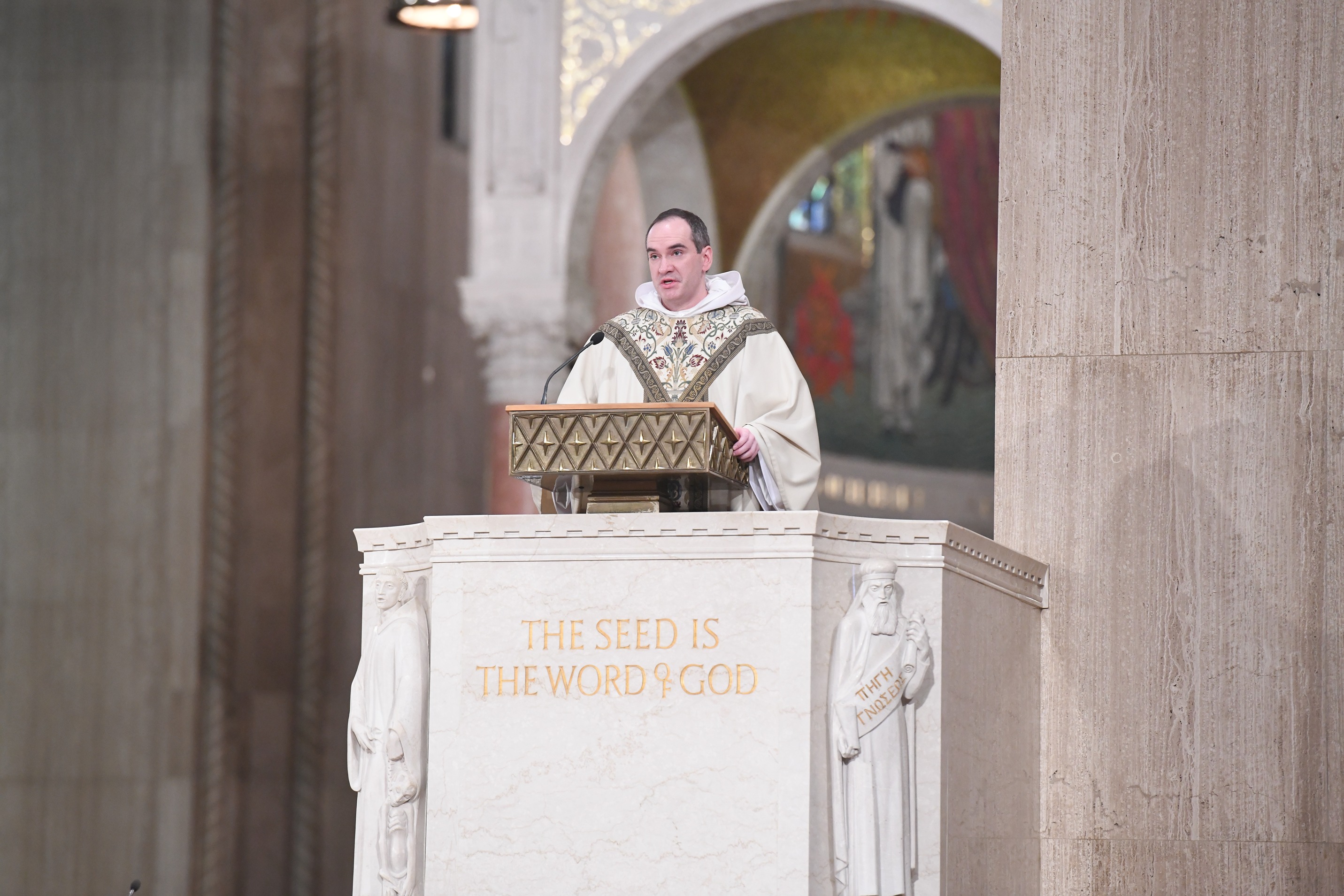 Father Ambrose Little, OP, shared his experience as a Catholic University student during the homily.