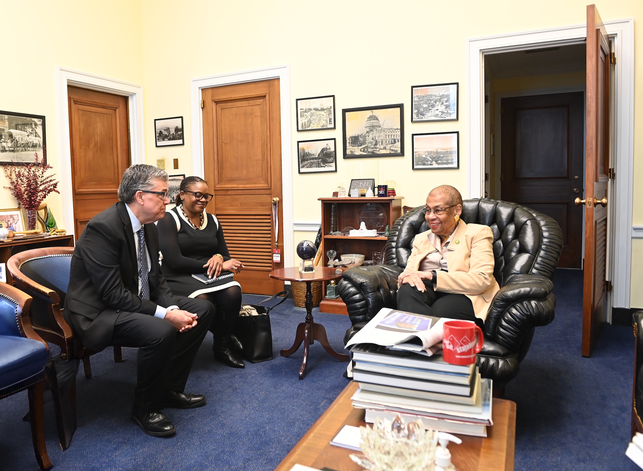 President Kilpatrick sitting with Delegate Eleanor Holmes Norton and an Alumna