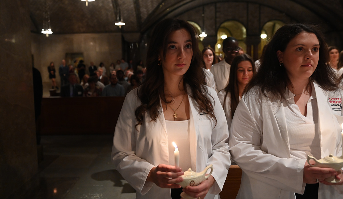 Nursing students holding their Nightingale Lamps