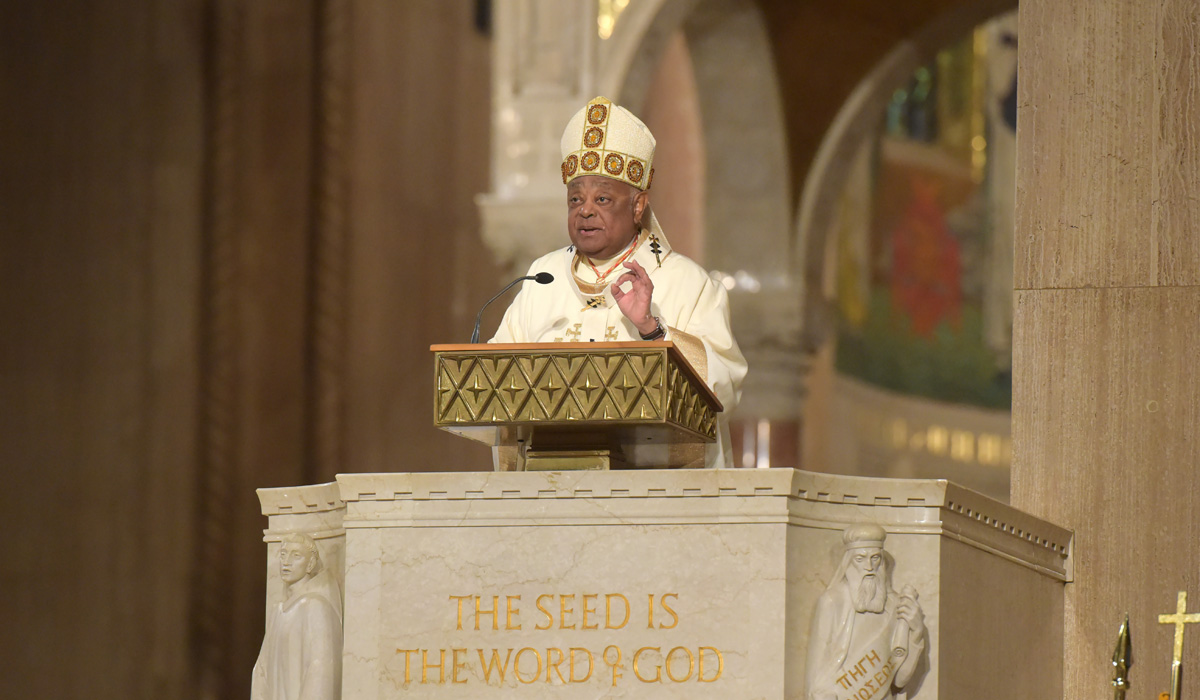 Cardinal gregory speaking at a podium