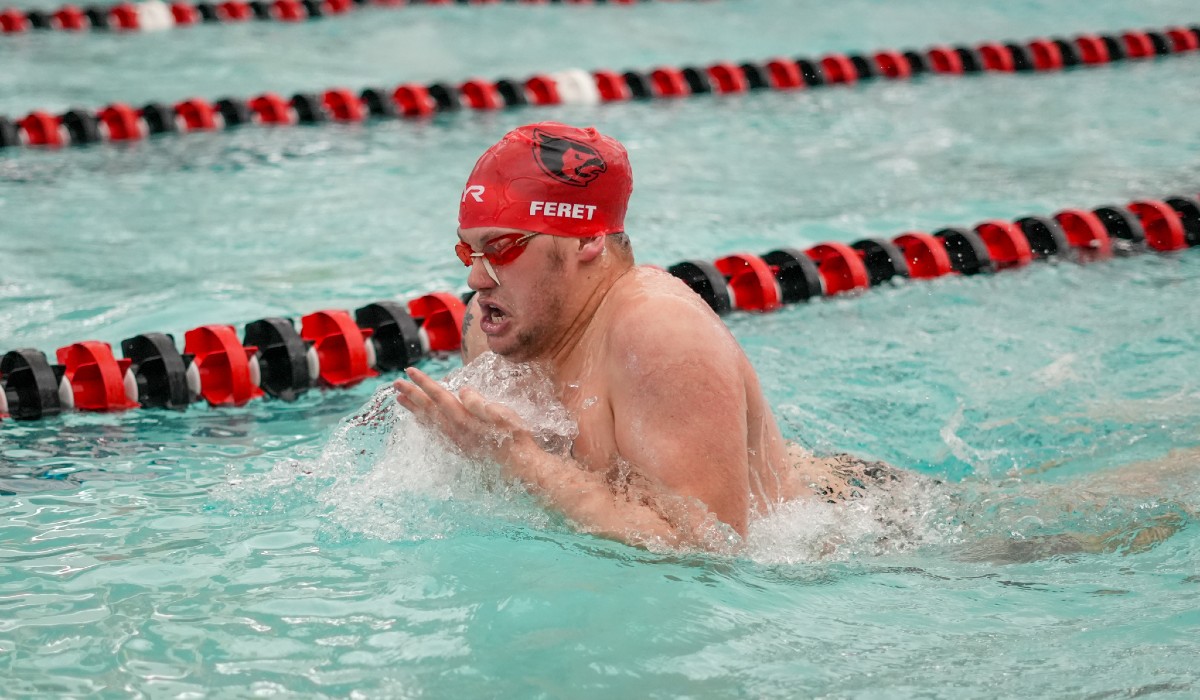 Elijah Feret Swimming in a pool