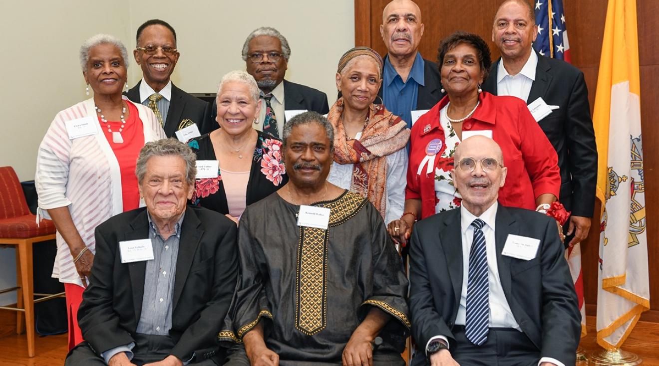 A group of people smiling at the camera