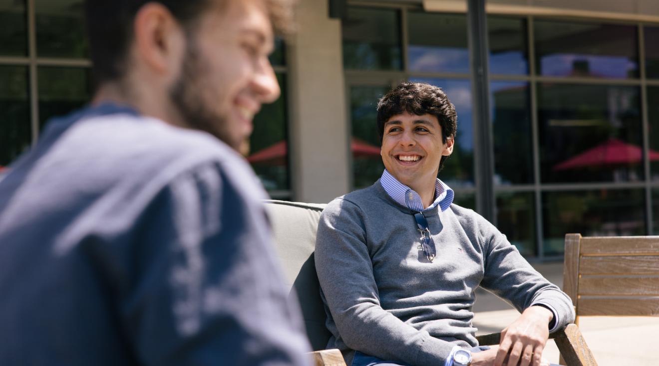 boys smiling and chatting outside