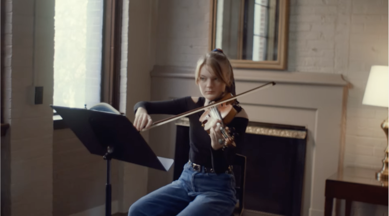 student playing violin