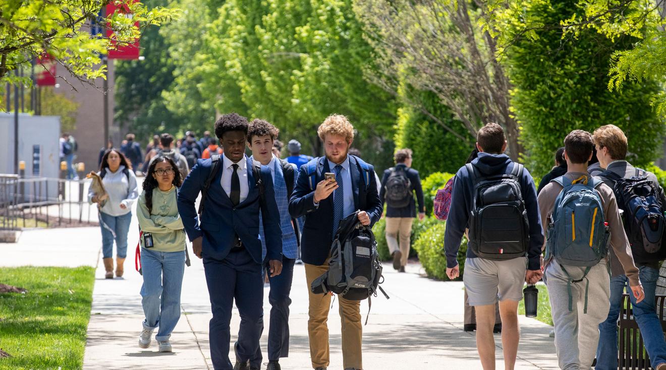 Students walking to class on campus.